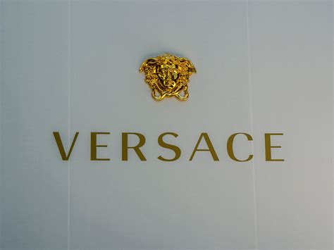 capri holdings buys versace|versace owner.